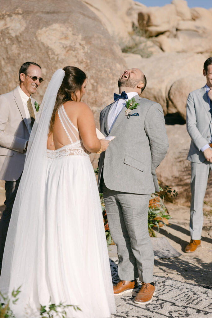 Cameron + Rick enjoying their vows during their ceremony in Joshua Tree